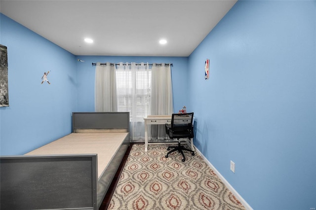 bedroom featuring recessed lighting and baseboards