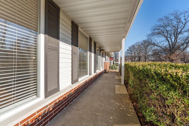 view of home's exterior with brick siding