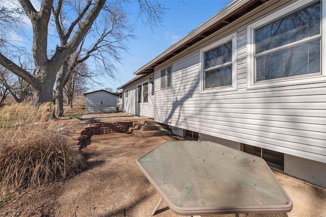 view of home's exterior with a patio