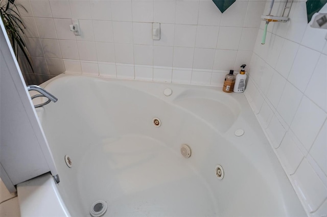 bathroom with a jetted tub