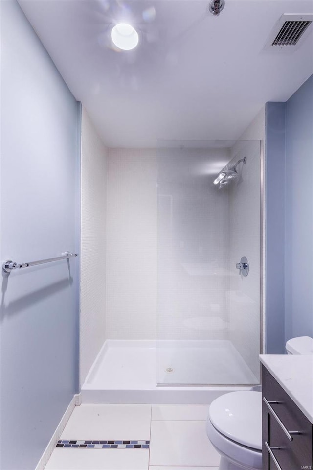 full bath with vanity, visible vents, a stall shower, tile patterned floors, and toilet