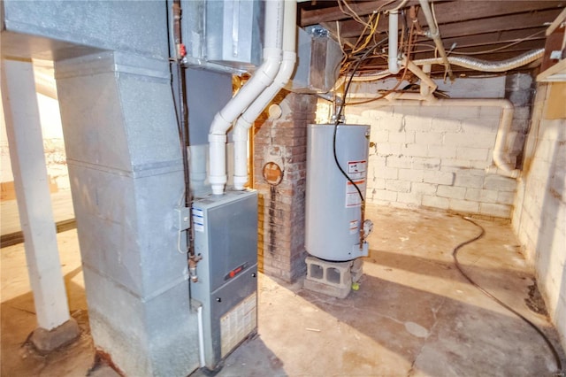 utility room with gas water heater