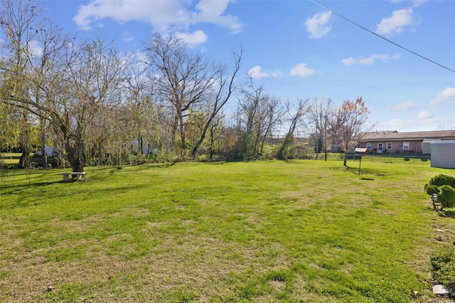 view of yard with fence