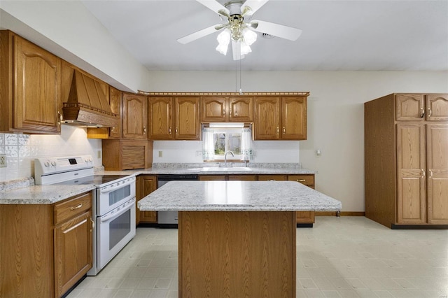 kitchen featuring a sink, stainless steel dishwasher, range with two ovens, light floors, and custom exhaust hood