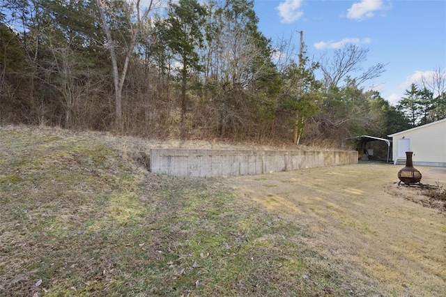 view of yard with a carport