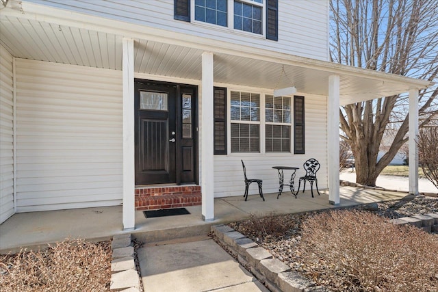 doorway to property with covered porch