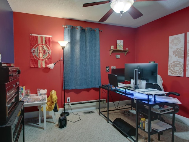 carpeted home office with a baseboard radiator, baseboards, and ceiling fan