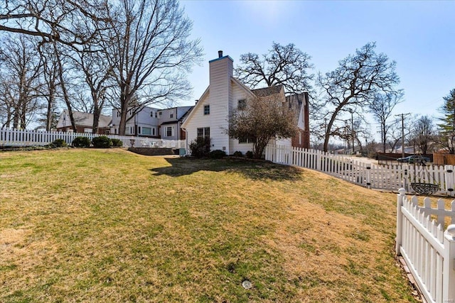 view of yard featuring a fenced backyard