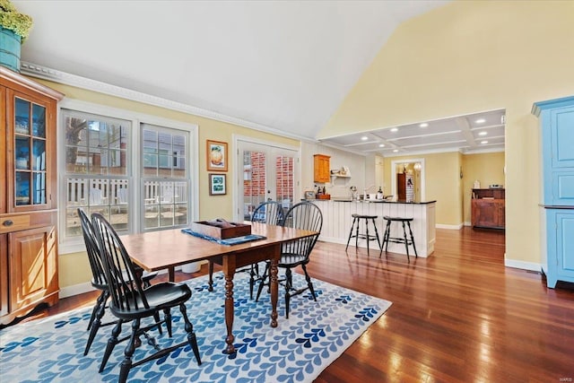 dining room with dark wood-style floors, french doors, baseboards, and coffered ceiling