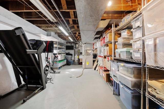 unfinished basement with water heater