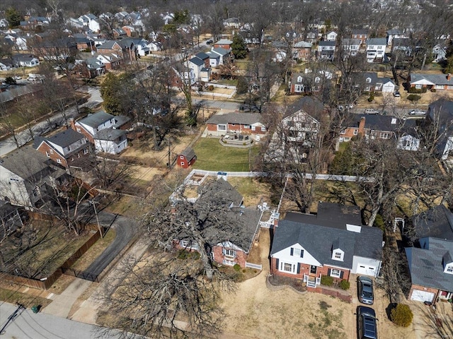 birds eye view of property with a residential view