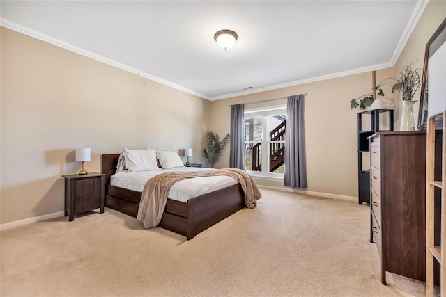 bedroom with light colored carpet, baseboards, and ornamental molding