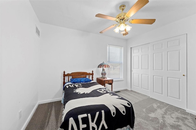 bedroom featuring carpet, baseboards, a closet, and ceiling fan