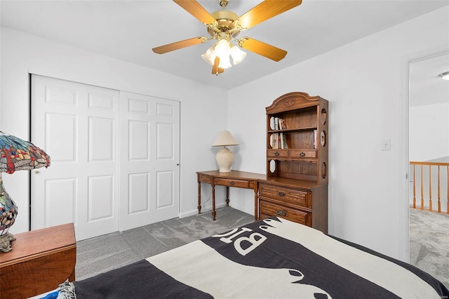 carpeted bedroom with a closet and ceiling fan