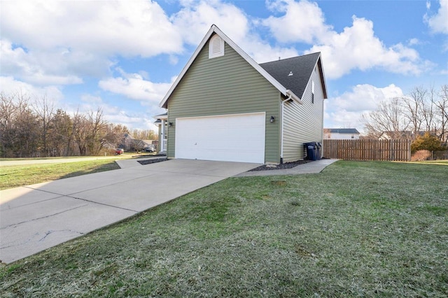 view of property exterior with an attached garage, a lawn, fence, and driveway