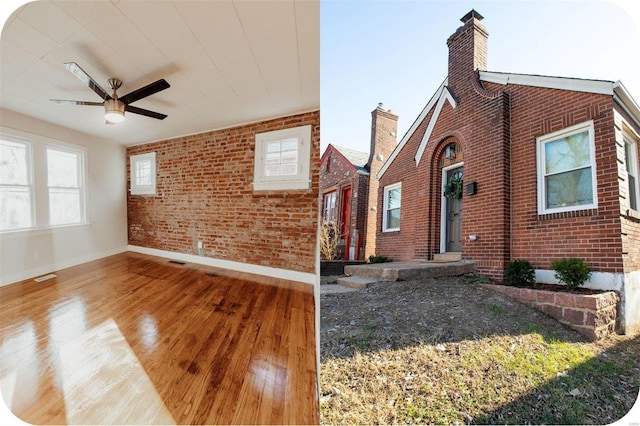 view of side of property with a chimney, brick siding, and ceiling fan