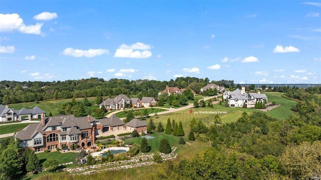 bird's eye view with a residential view and a view of trees