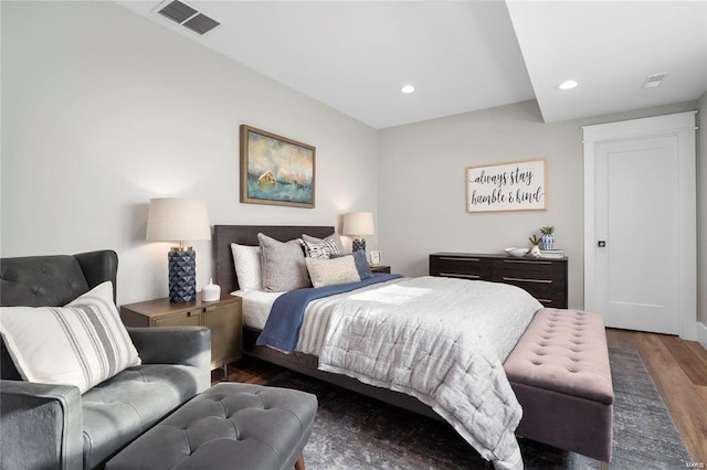 bedroom with recessed lighting, visible vents, and wood finished floors