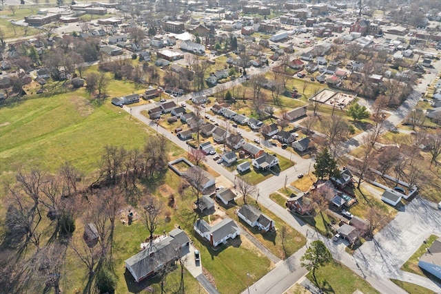 birds eye view of property with a residential view