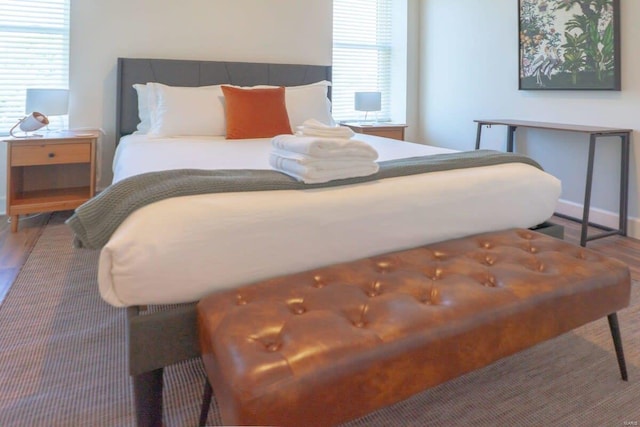 bedroom featuring wood finished floors