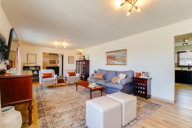 living room with wood finished floors and baseboards