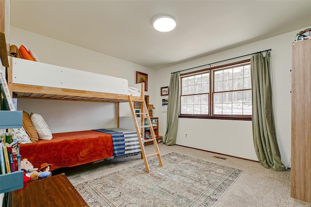 bedroom featuring carpet and visible vents