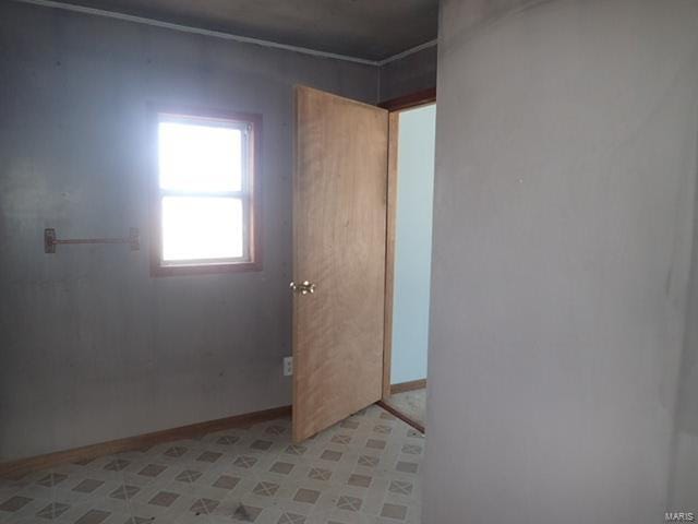 spare room with light floors