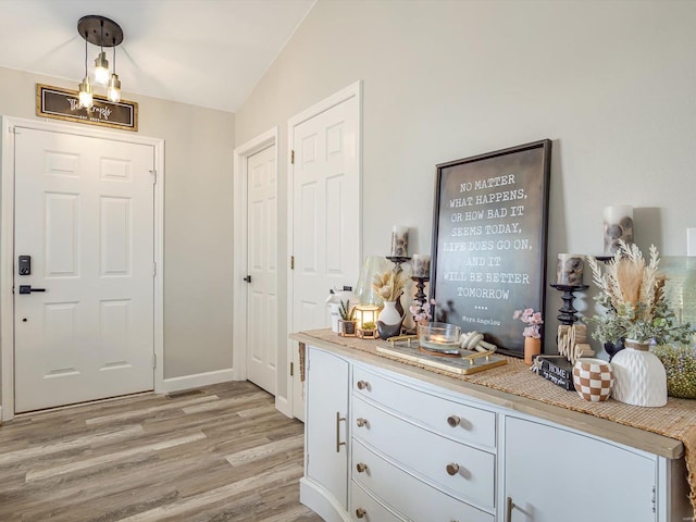 entrance foyer featuring light wood-type flooring