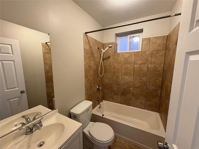 bathroom with washtub / shower combination, toilet, and vanity