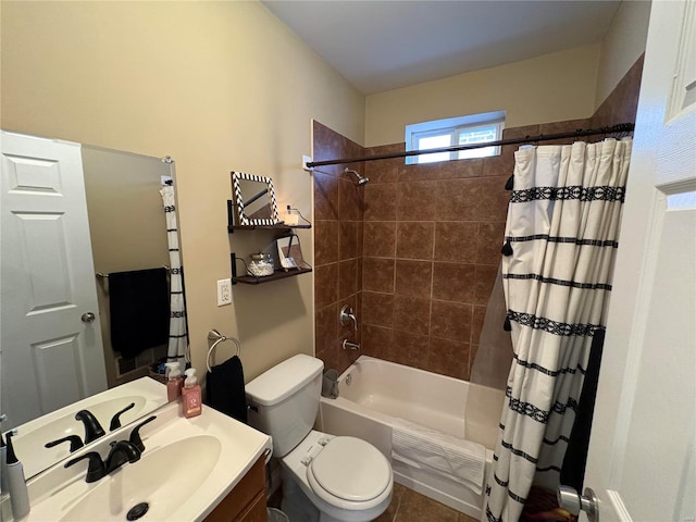 bathroom featuring vanity, toilet, and shower / tub combo