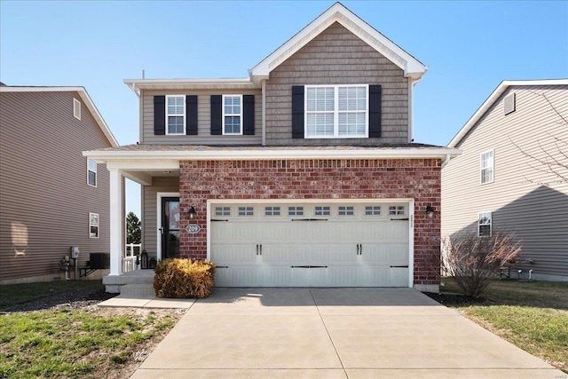 view of front facade with brick siding, driveway, and a garage