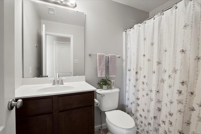 bathroom with a shower with shower curtain, visible vents, toilet, and vanity