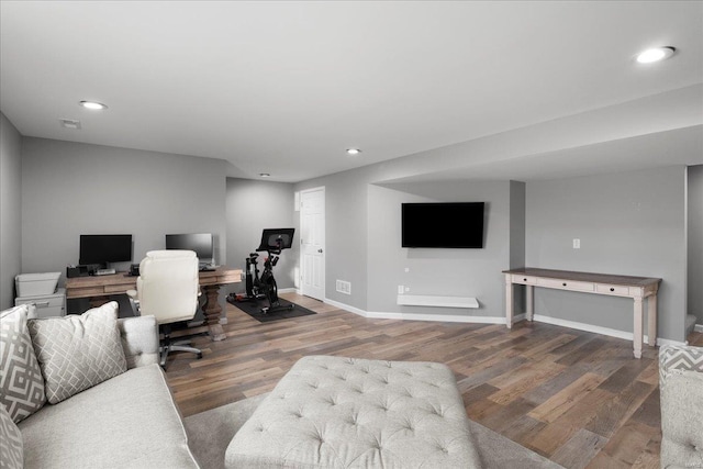 home office featuring recessed lighting, baseboards, and wood finished floors