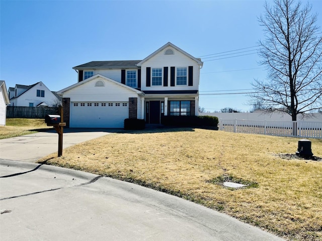 traditional-style house featuring driveway, an attached garage, a front lawn, and fence