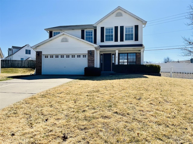 traditional home featuring brick siding, driveway, an attached garage, and fence