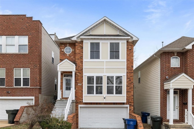 view of front of home with brick siding, driveway, and an attached garage