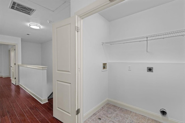 laundry area with baseboards, visible vents, laundry area, electric dryer hookup, and washer hookup