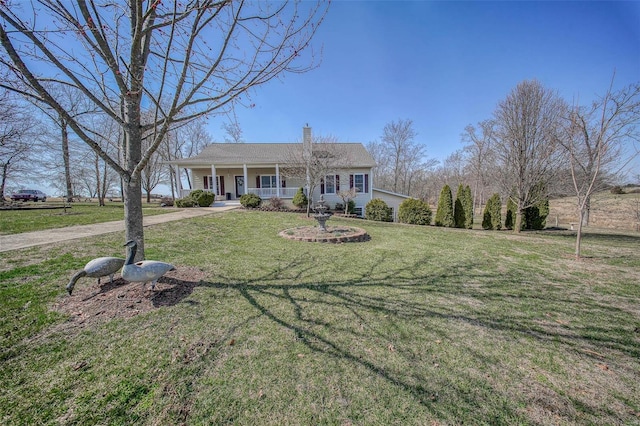 view of front facade featuring covered porch, a chimney, and a front lawn