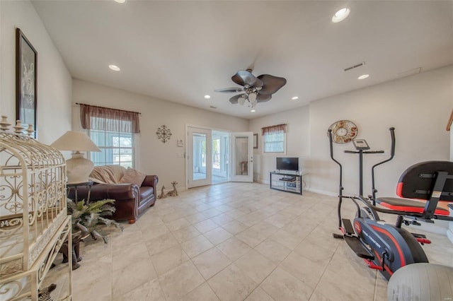 exercise area with baseboards, recessed lighting, visible vents, and ceiling fan