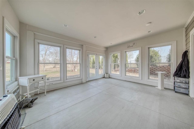 unfurnished sunroom with french doors and plenty of natural light