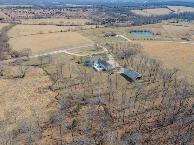 bird's eye view with a rural view and a water view