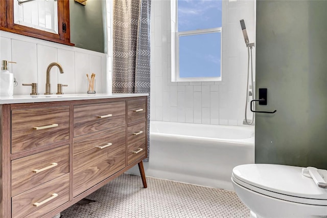 full bath featuring tile patterned floors, shower / bathtub combination with curtain, toilet, and vanity