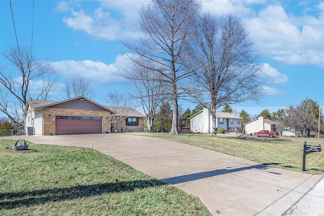 single story home with an attached garage, central AC, a front lawn, concrete driveway, and brick siding