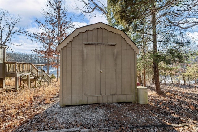 view of shed with stairway