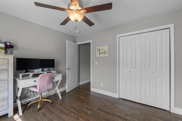 office with baseboards, a ceiling fan, and wood finished floors