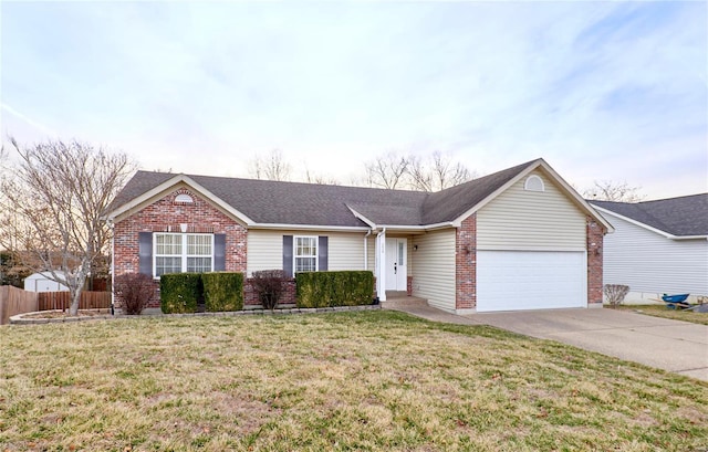 ranch-style home with fence, a front lawn, concrete driveway, a garage, and brick siding