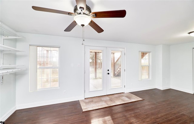 interior space with dark wood-style floors, plenty of natural light, and french doors