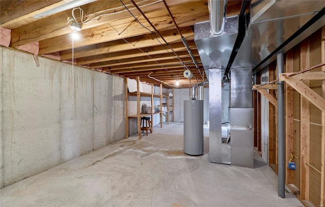 unfinished basement with gas water heater and heating unit