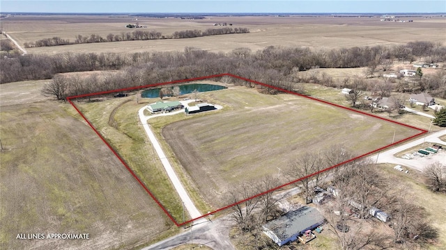 birds eye view of property featuring a rural view