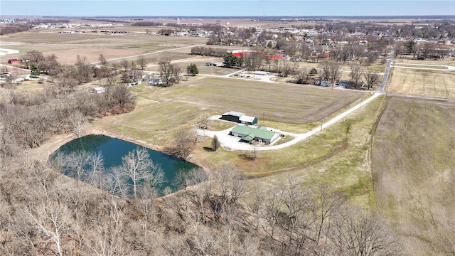 bird's eye view with a rural view and a water view